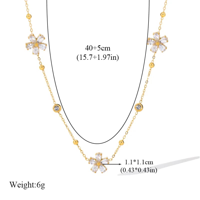 Parure de bijoux fleur avec zircons blancs