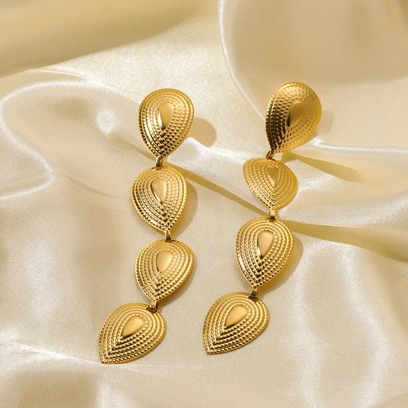 Boucles d'oreilles pendantes longues à pompons, couleur dorée