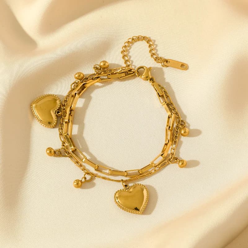 Bracelet breloques soleil lune étoile de mer dorées