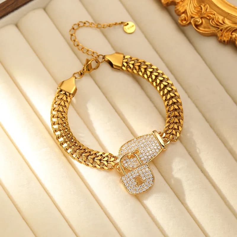 Bracelet chaîne en acier inoxydable avec breloque cadenas strass