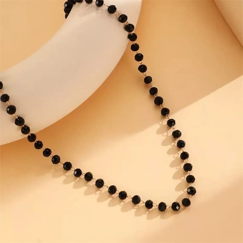 Parure collier et bracelet à perles noires et chaînes