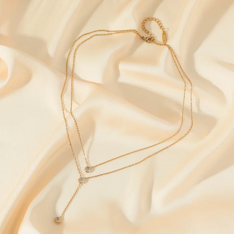 Collier double rang en acier inoxydable avec zirconia blanc