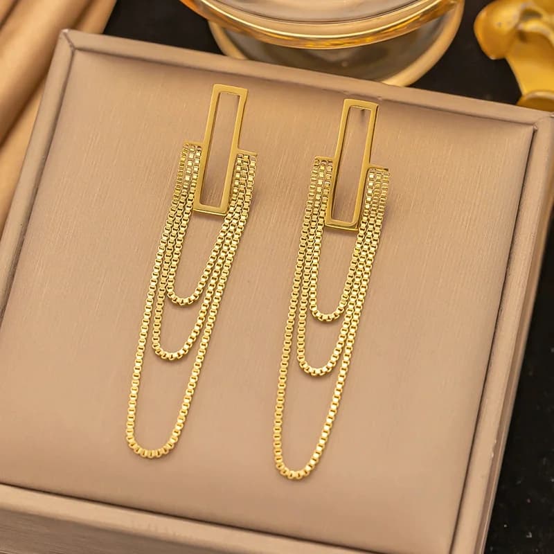 Boucles d'oreilles pendantes irrégulières à pompons en acier inoxydable