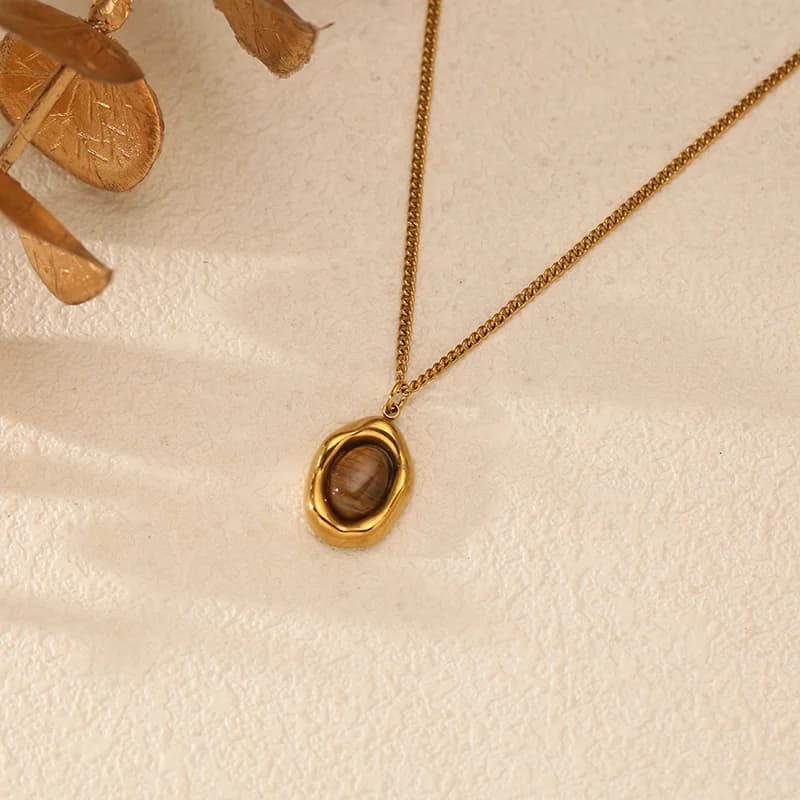 Collier pendentif pierre brune vintage