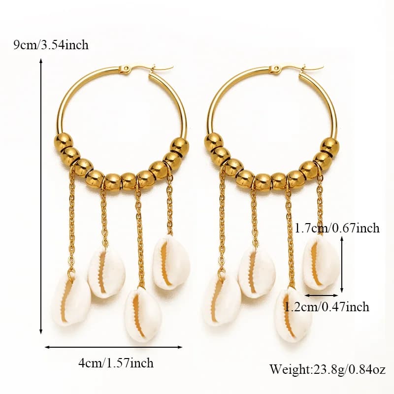 Boucles d'oreilles créoles pendentif coquillage et pompon