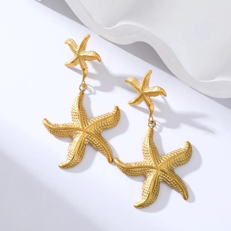 Boucles d'oreilles pendantes feuilles de palmier, plaquées or