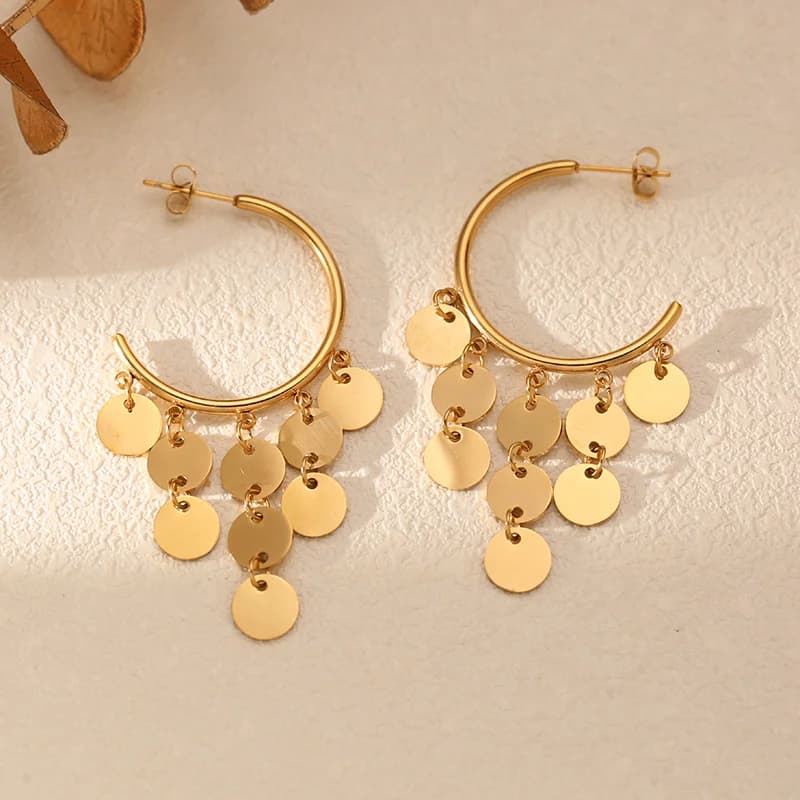 Boucles d'oreilles créoles pendentif coquillage et pompon