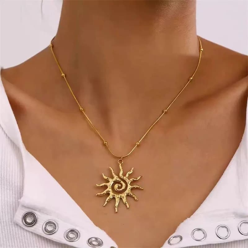 Parure collier et boucles d'oreilles soleil vintage