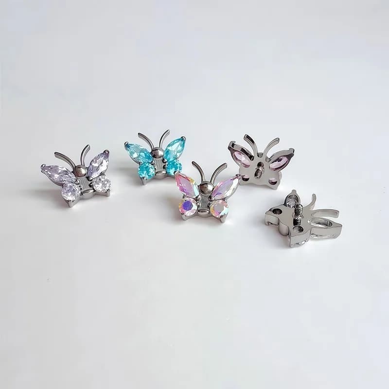 Piercing corporel papillon spiralé titane zircon