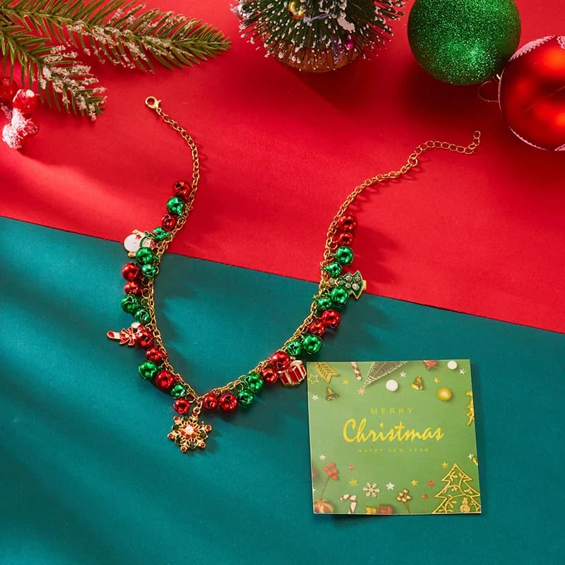 Collier pendentif flocon de neige et cloche de Noël