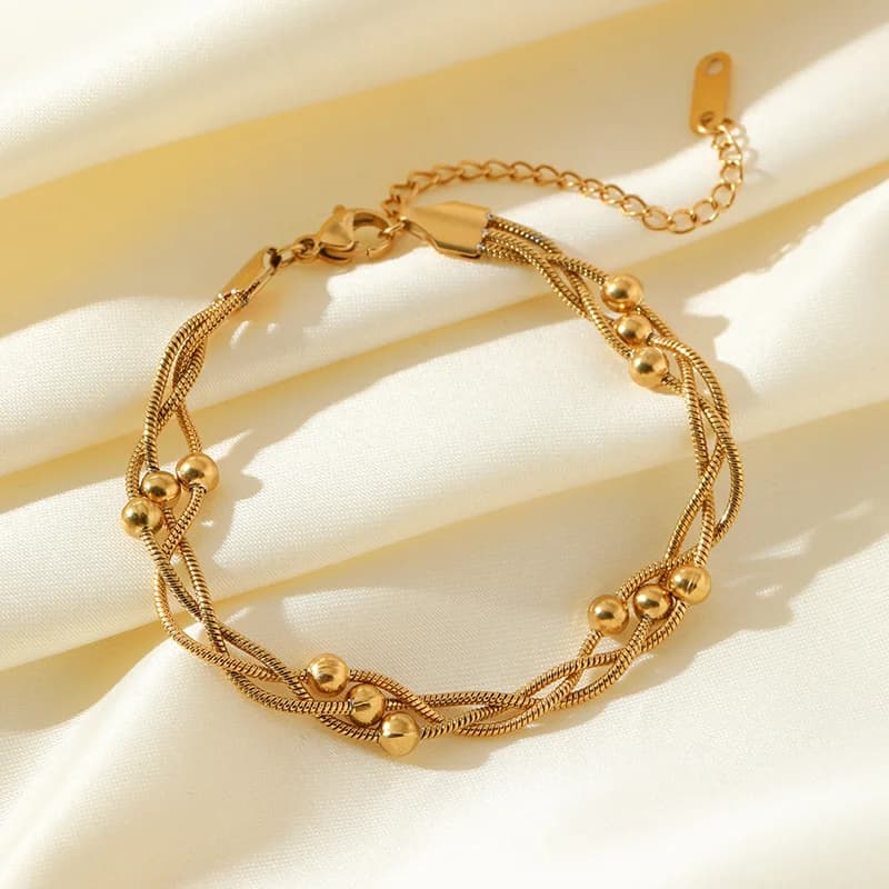 Bracelet chaîne torsadée à perles, plaqué or