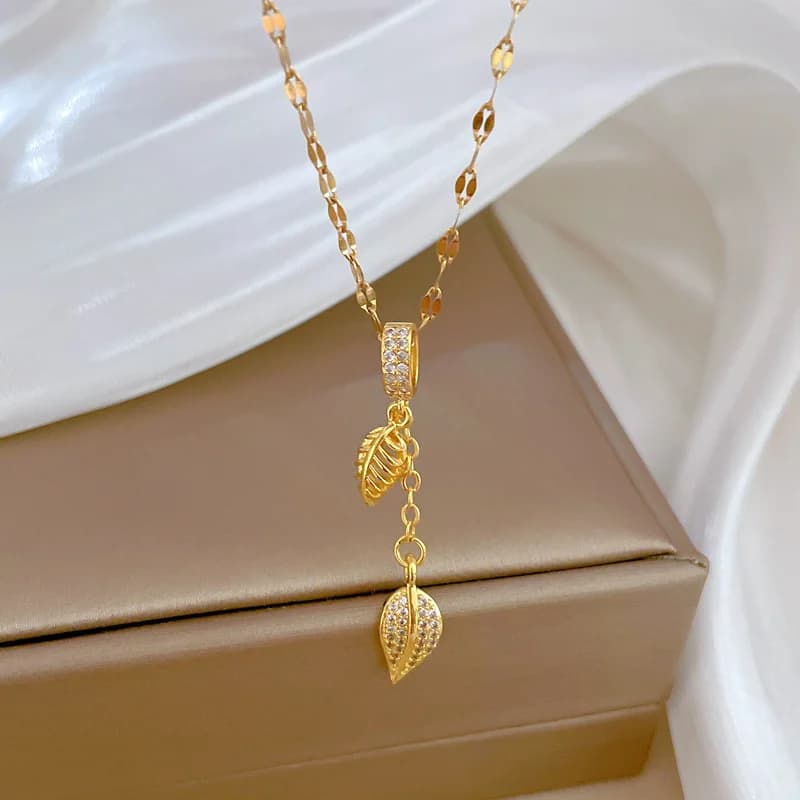 Collier pendentif feuille en acier inoxydable 316L avec zircons