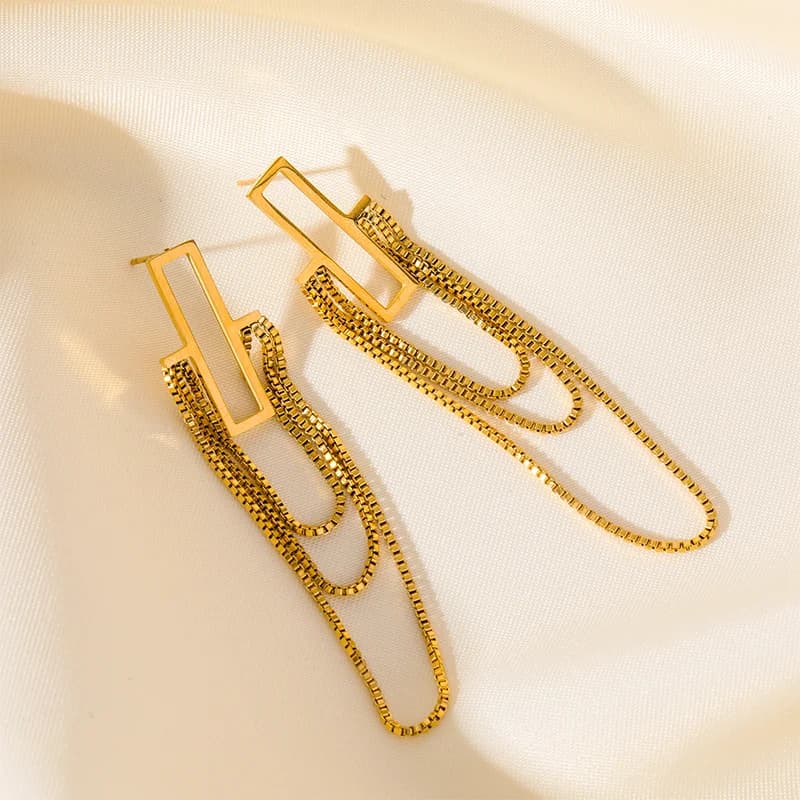 Boucles d'oreilles pendantes à glands dorées