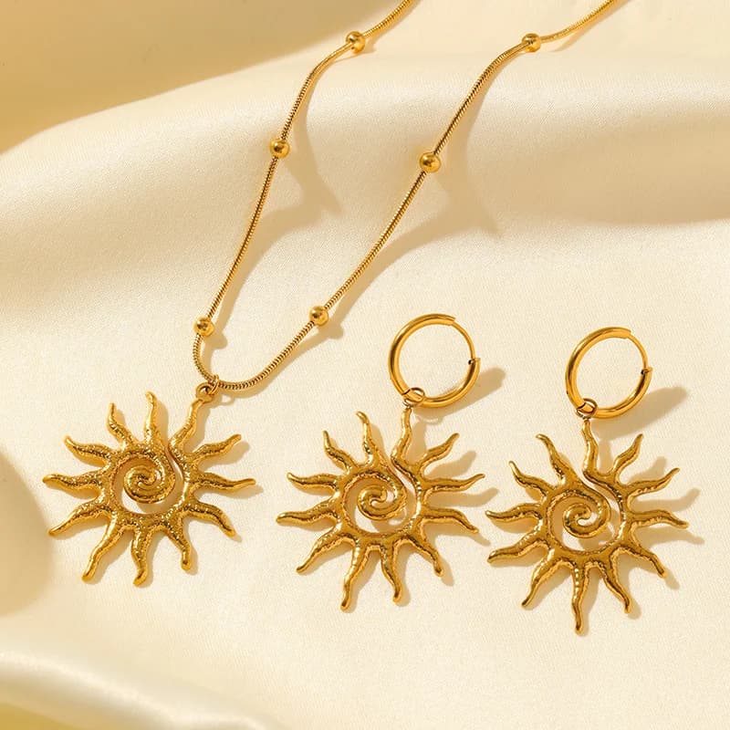 Parure collier et boucles d'oreilles soleil vintage