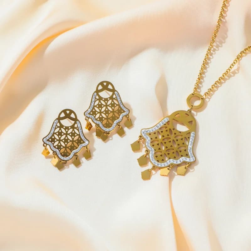 Parure collier et boucles d'oreilles breloques œil et main vintage