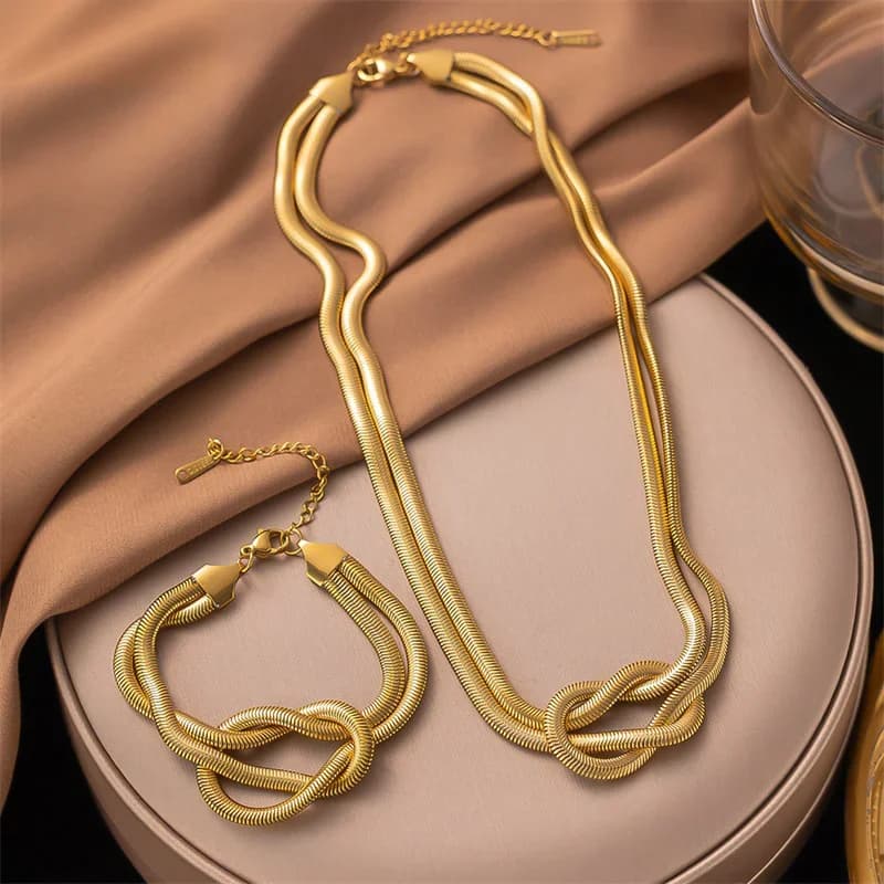 Ensemble collier et bracelet chaîne torsadée couleur or