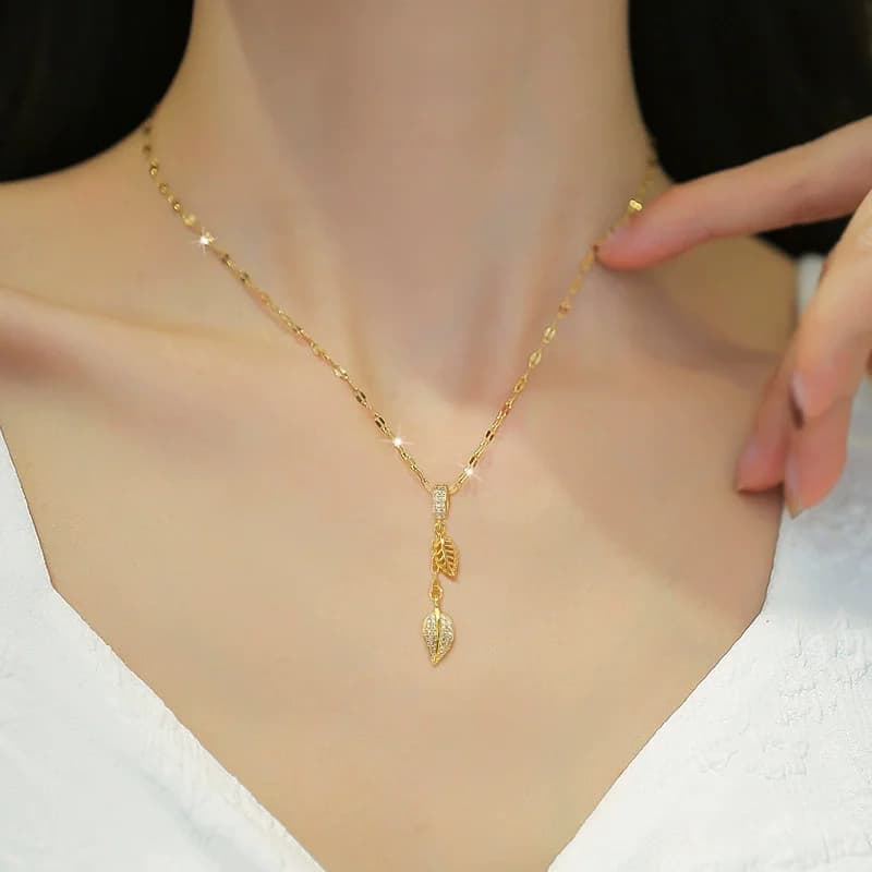 Collier pendentif feuille en acier inoxydable 316L avec zircons